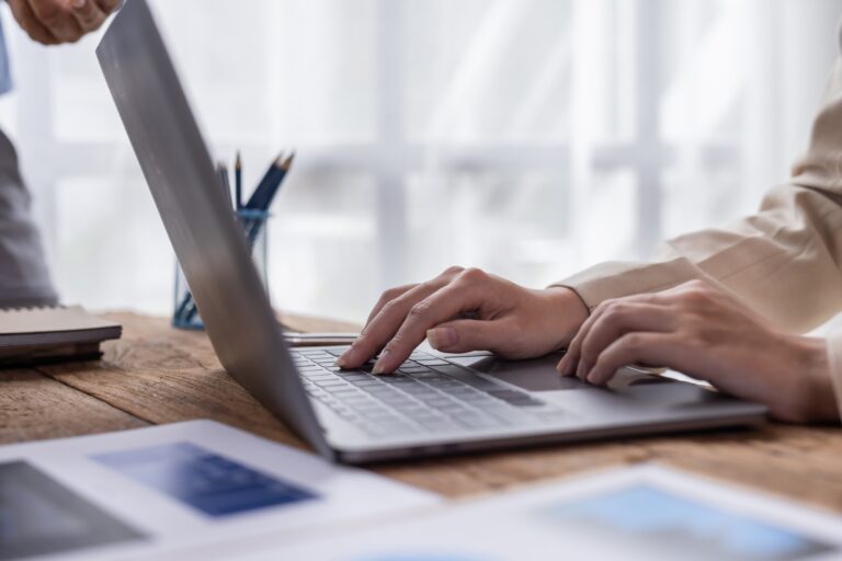 Financial analysts analyze business financial reports on digital tablet planning investment project